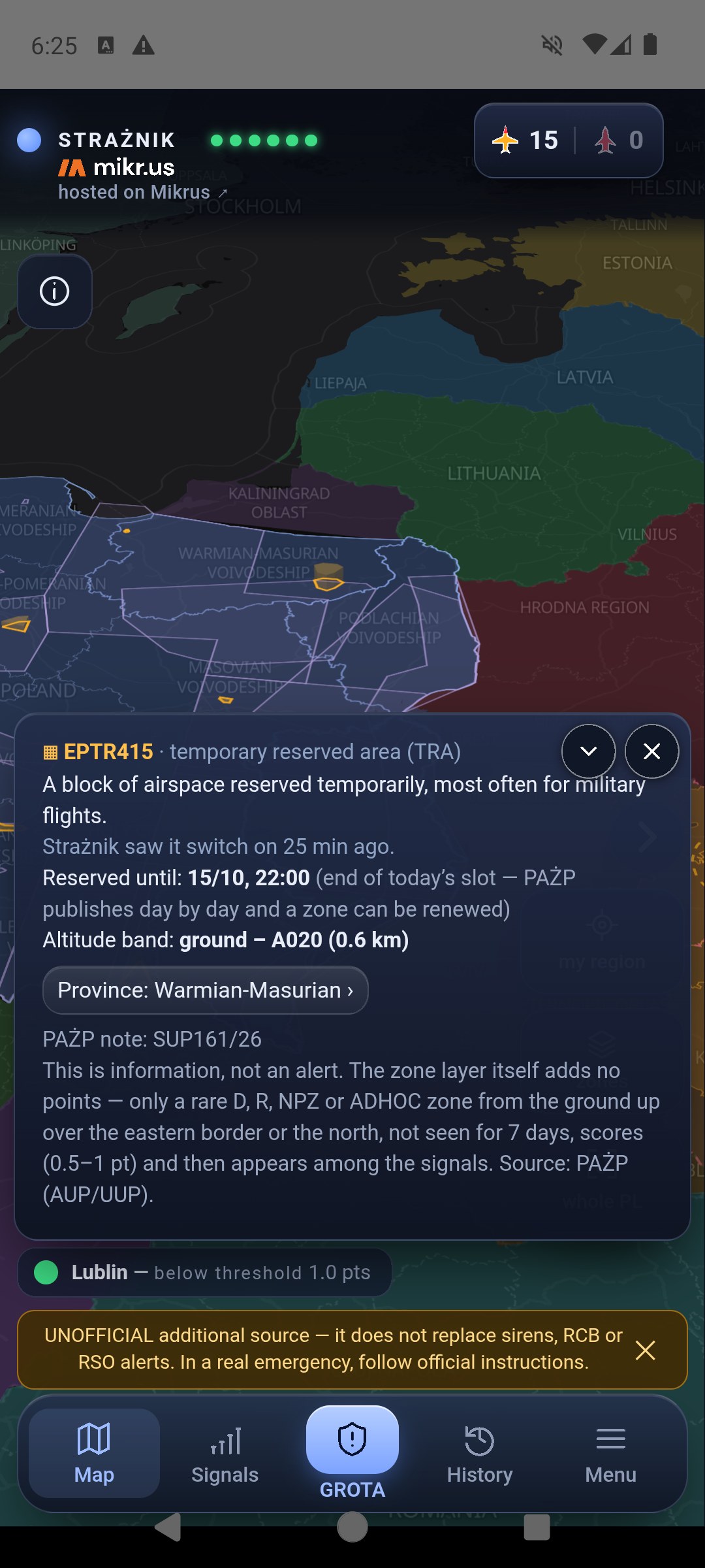 Card of zone EPTR415, temporary reserved area TRA: a block of airspace reserved temporarily, switched on 25 minutes ago, reserved until 15/10 22:00, altitude band ground to A020, province Warmian-Masurian, PAŻP note SUP161/26 and an explanation that this is information, not an alert