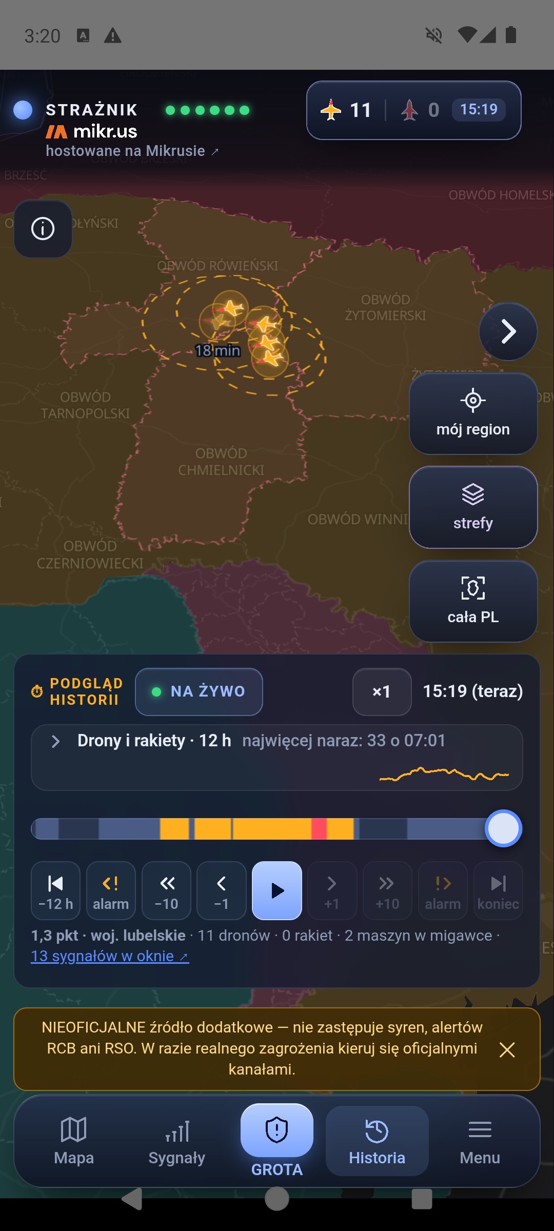 Tryb historii z wykresem zwiniętym do jednego wiersza Drony i rakiety · 12 h, najwięcej naraz 33 o 07:01, z miniaturą krzywej; mapa przesunięta nad niższy pasek
