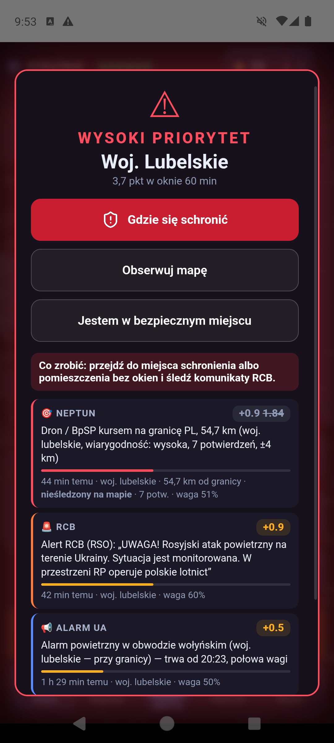 Ten sam testowy ekran po potwierdzeniu: w miejscu przycisku trzy przyciski Gdzie się schronić, Obserwuj mapę i Jestem w bezpiecznym miejscu, a pod nimi Co zrobić i powody